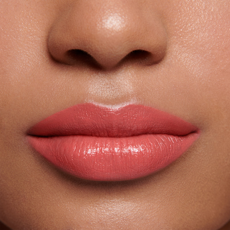 Lily Lolo Vegan Lipstick Coral Crush applied on lips